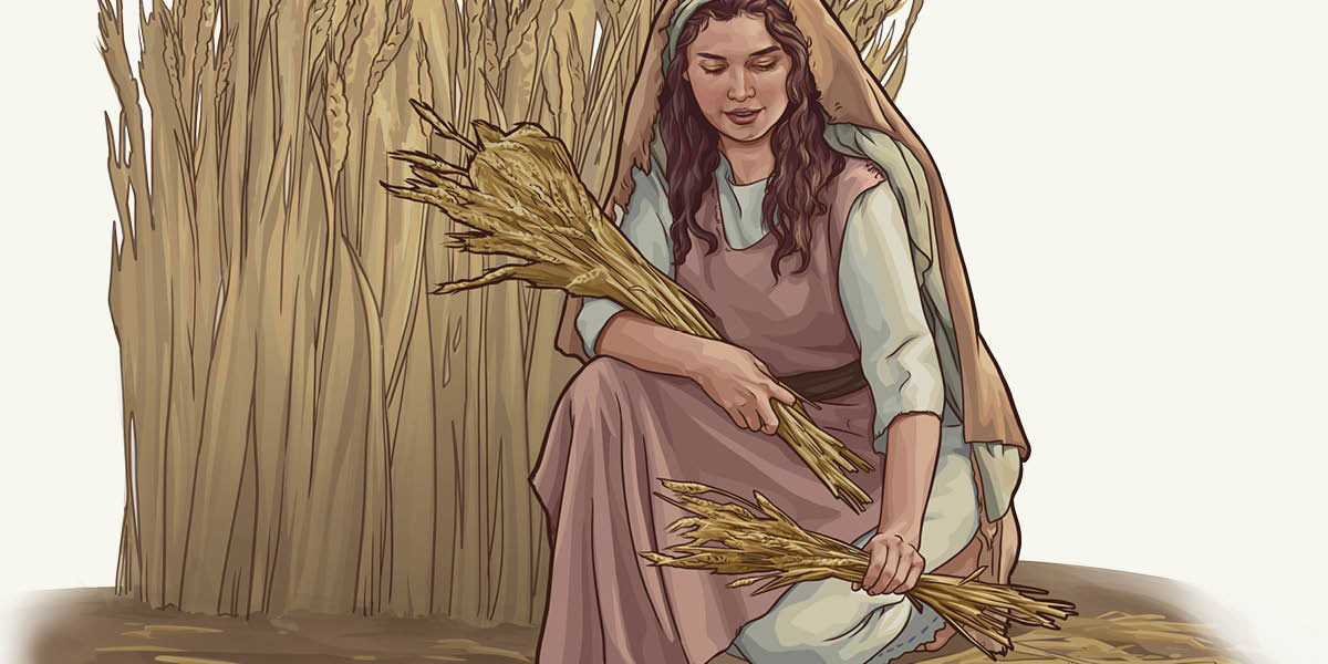 امرأة اسرائيلية تلتقط سنابل قمح في حقل