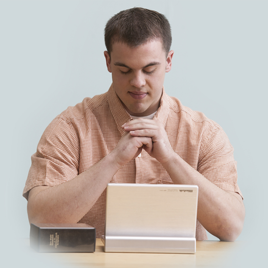 A Bible student dedicates himself to God in prayer