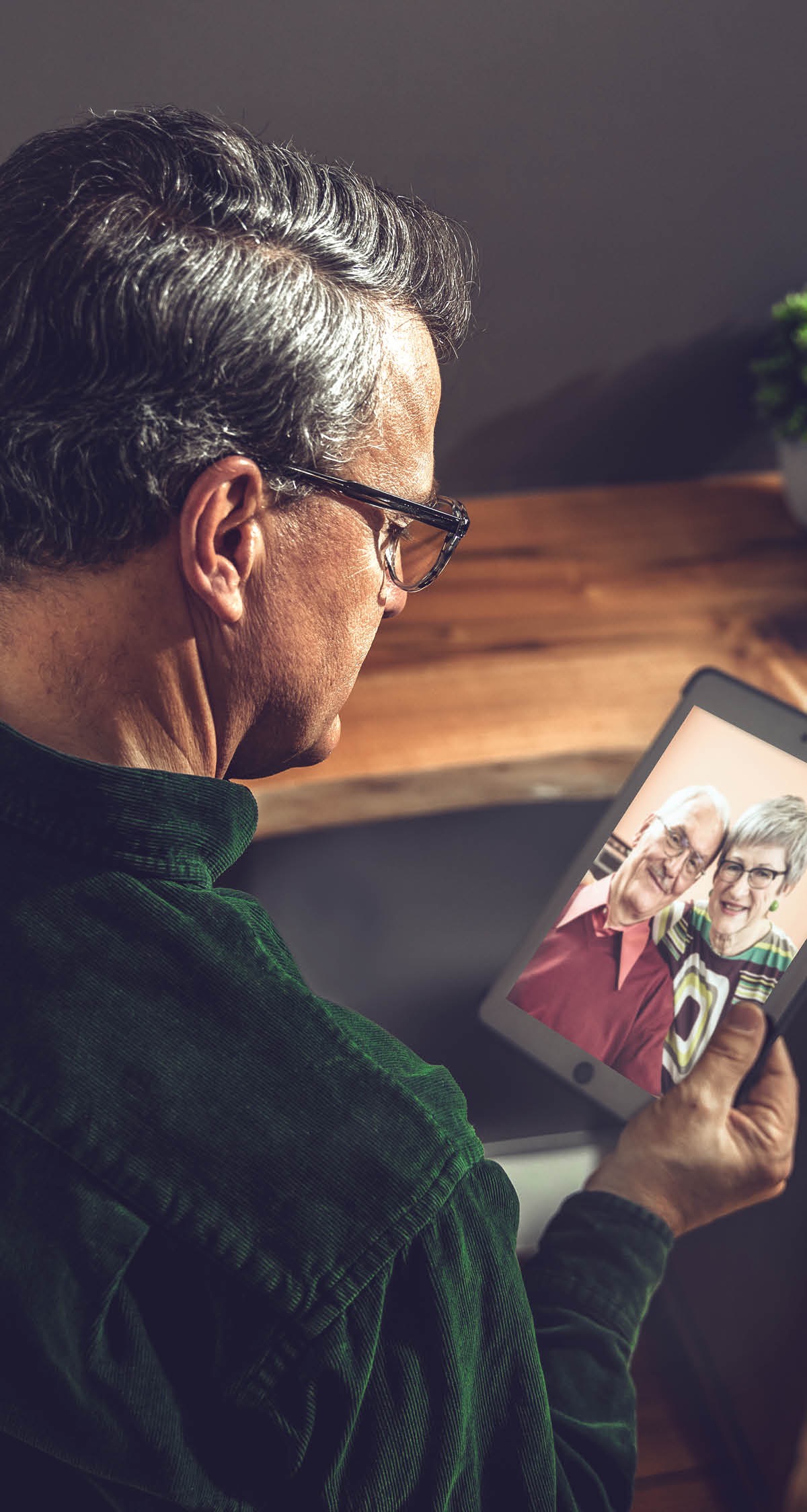 One of the scientists referred to earlier holds a picture of the older couple in the opening article