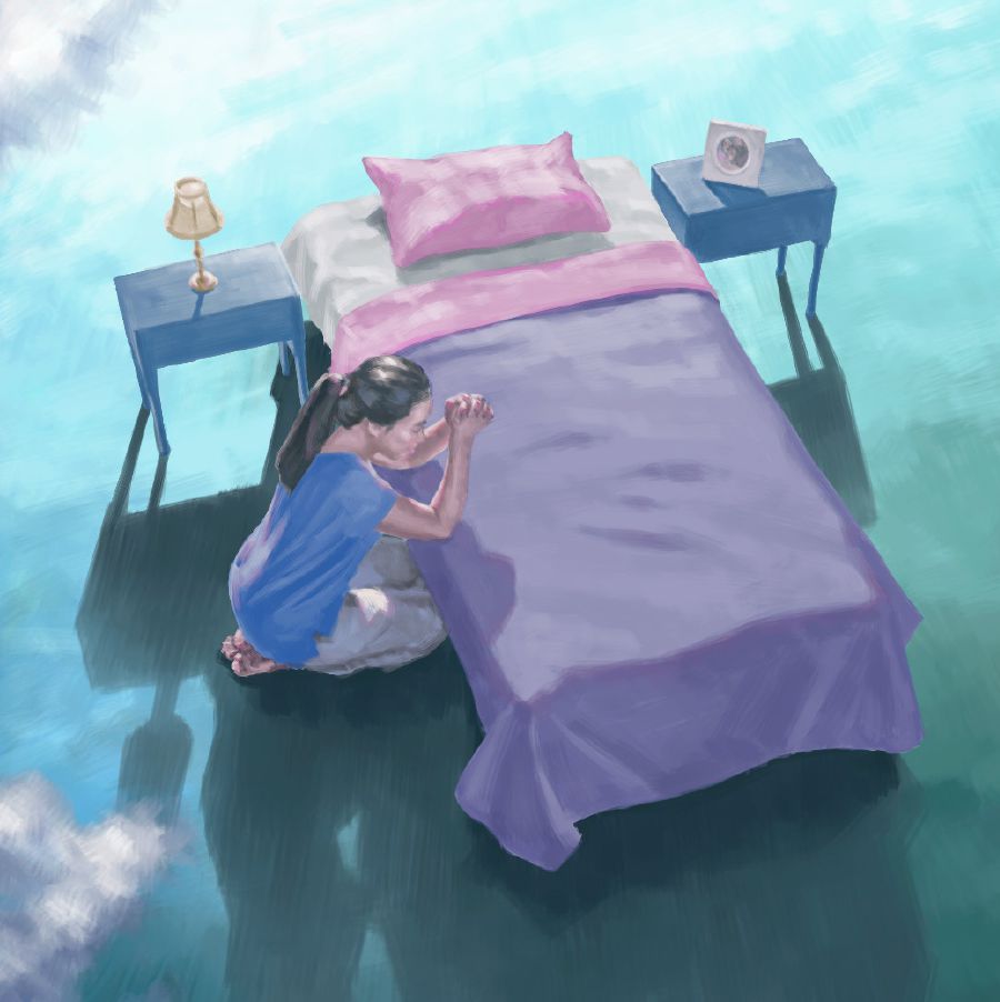 Babaye nagluhod nga nag-ampo ug nagpahinungod sa kaugalingon