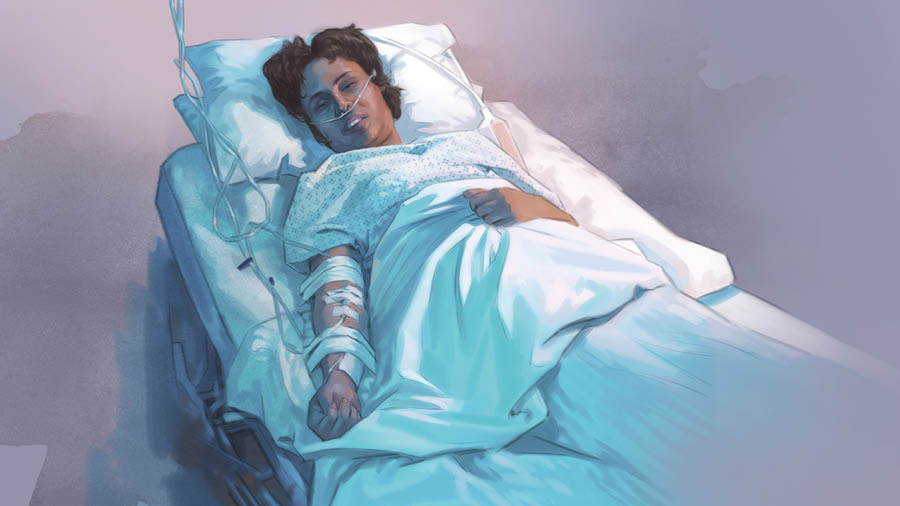 Una mujer en la cama de un hospital con una vía intravenosa en el brazo y un tubo de oxígeno en la nariz.