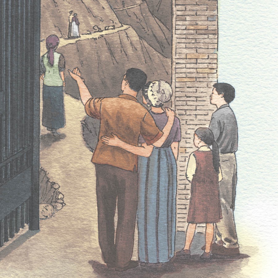 A family stands beside a narrow gate and looks at people on a cramped road