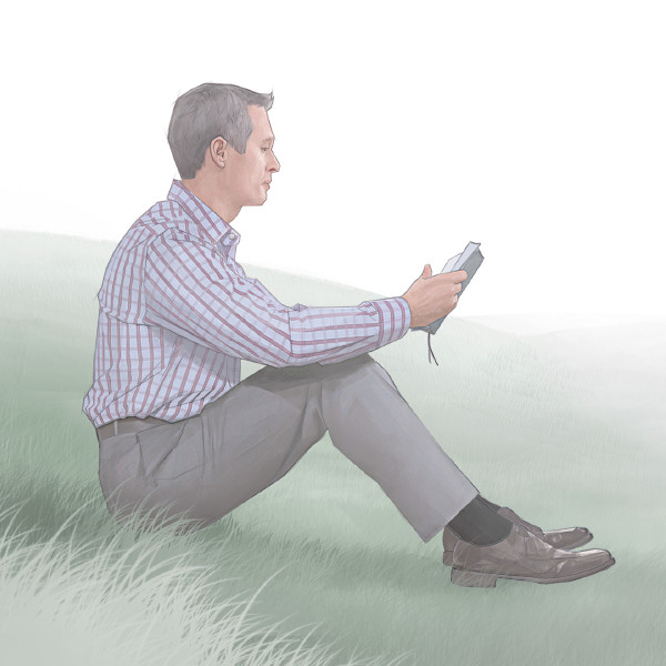 Ein Mann, der in der Bibel liest