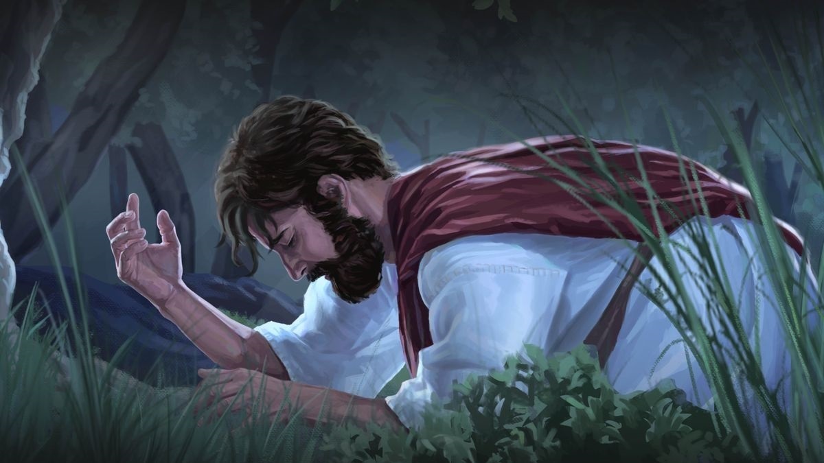 Jesús ora con fervor en el jardín de Getsemaní.