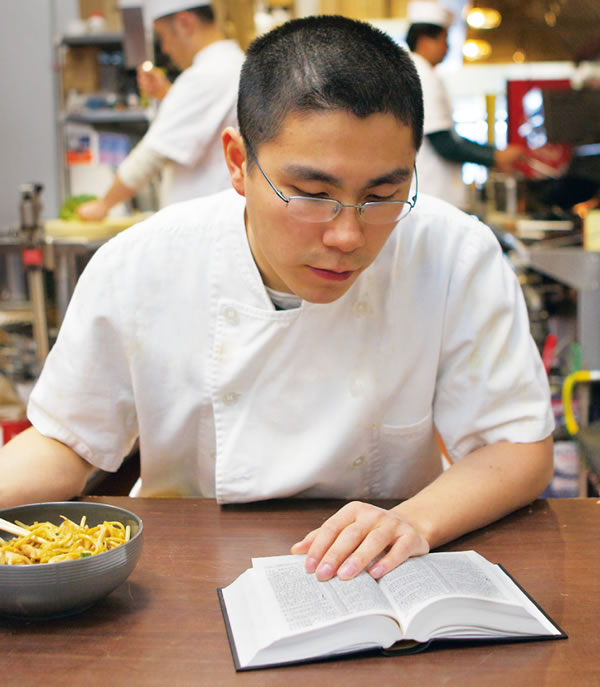 A man reading God’s Word during a break at work
