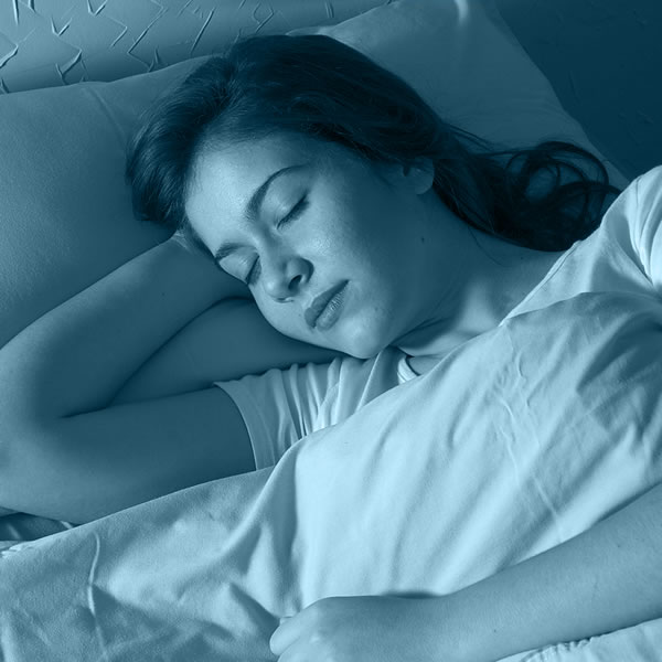 A girl eating an apple