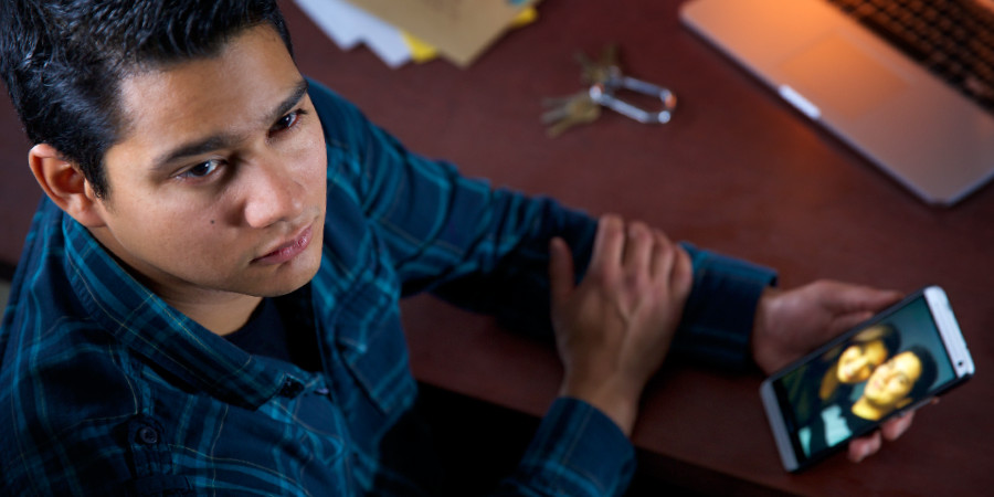 A young man thinking about the girl he broke up with