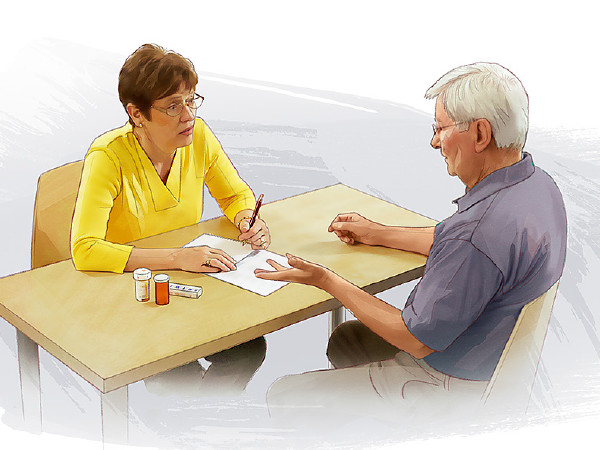 A wife helps her husband make a list of his symptoms and medications