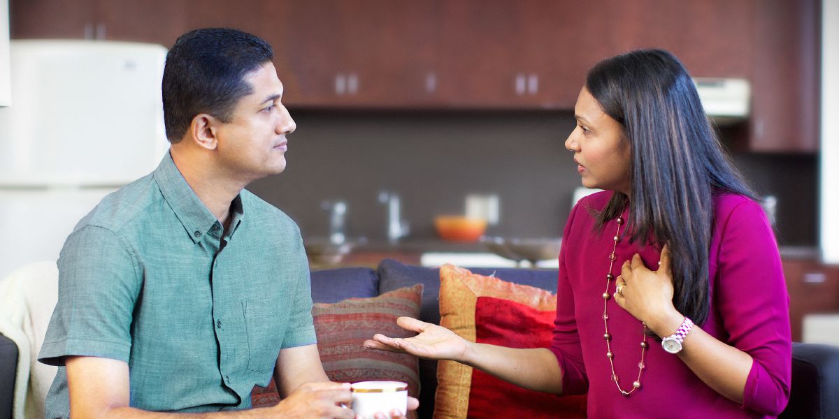 A husband listens to his wife