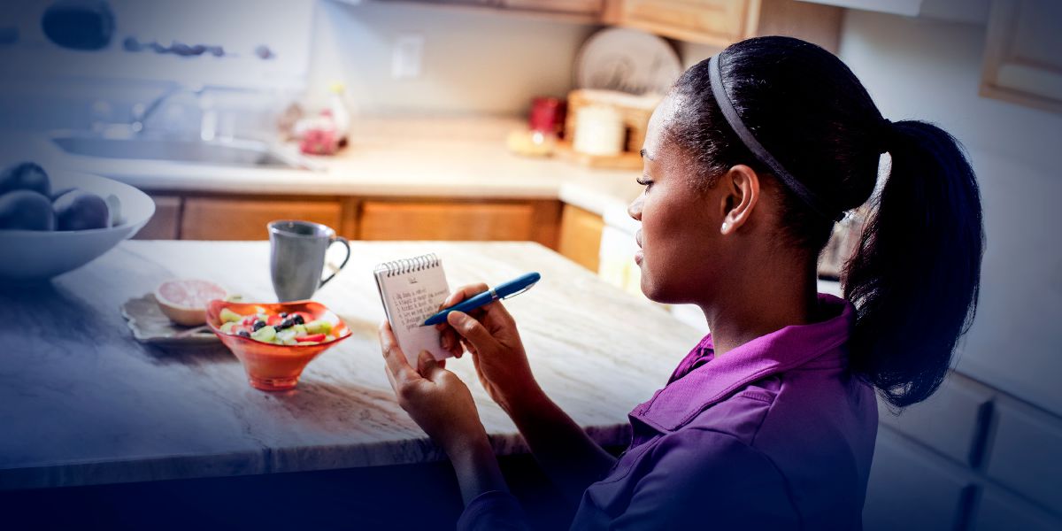 A woman makes a list