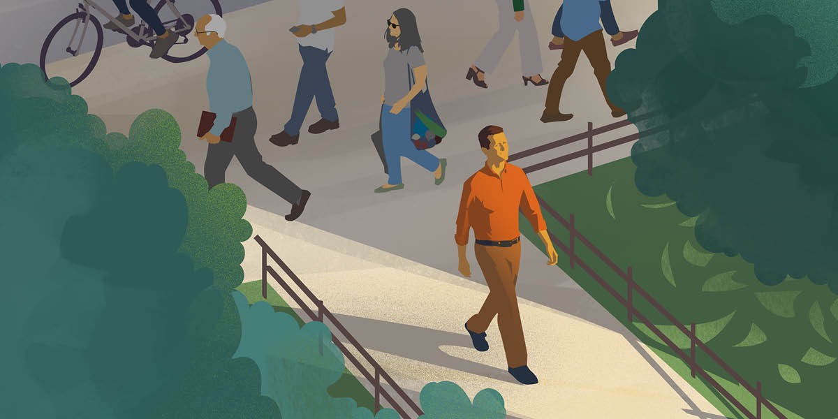 A man walks away from a crowd