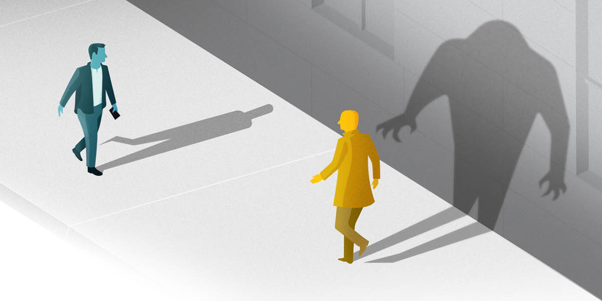 Two men walking toward each other. One man imagines the other’s shadow to be ominous and looming.