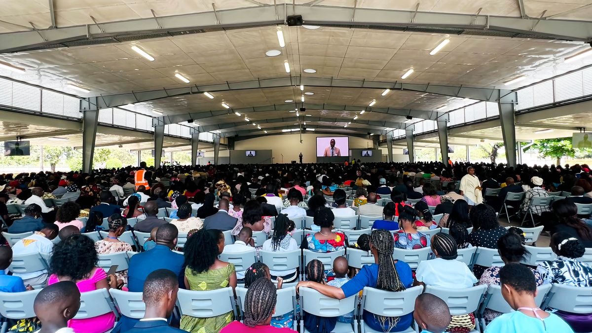 Brothers and sisters attending a circuit assembly at the Matola Assembly Hall.