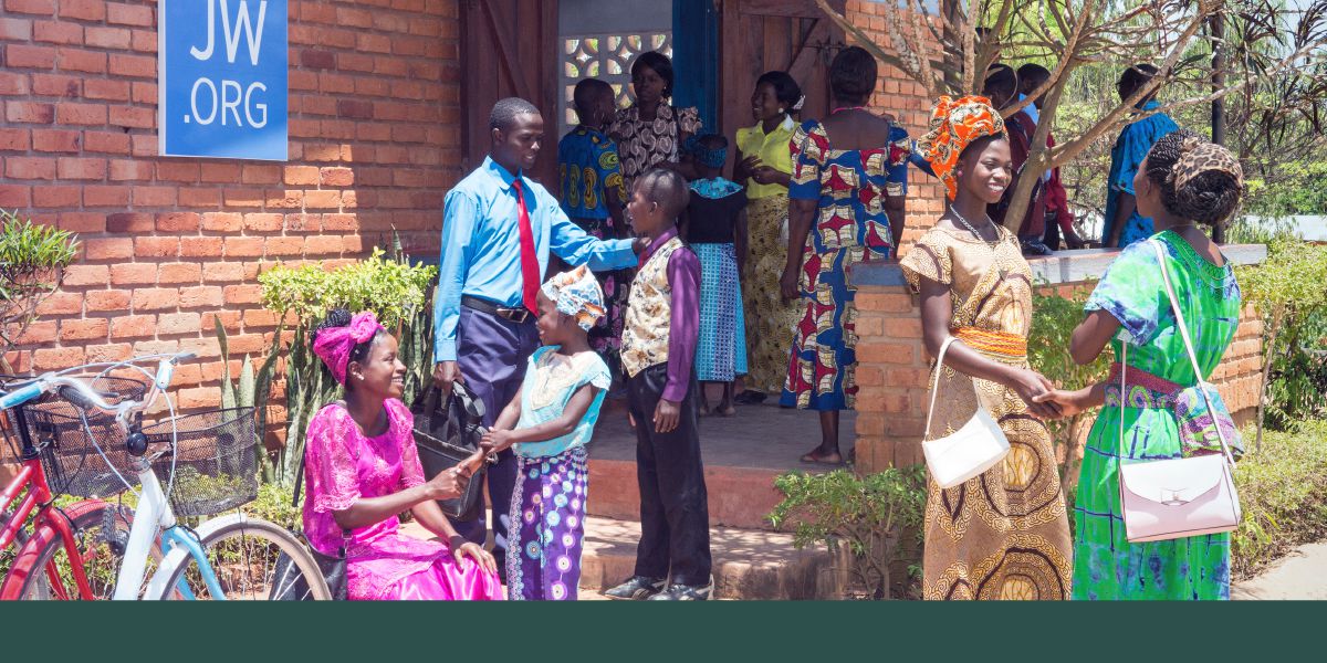 Jehovah’s Witnesses greet one another outside a Kingdom Hall in Malawi