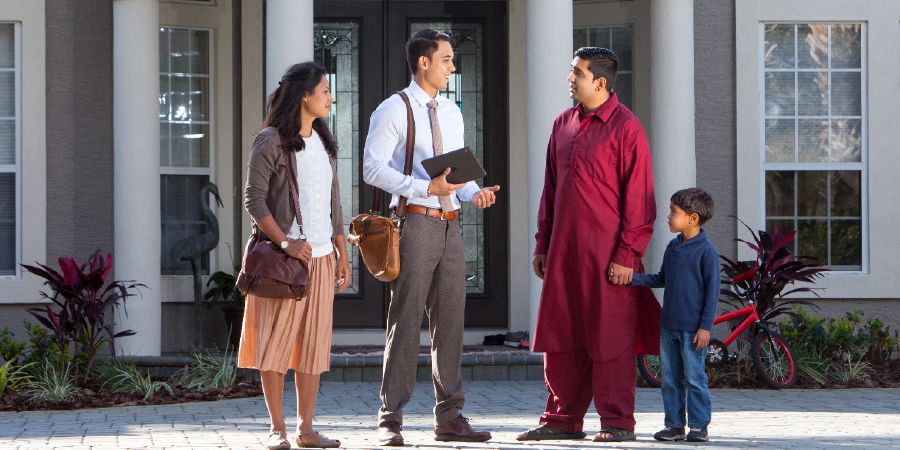 A couple in the field ministry meet a man and his son who speak a language other than theirs