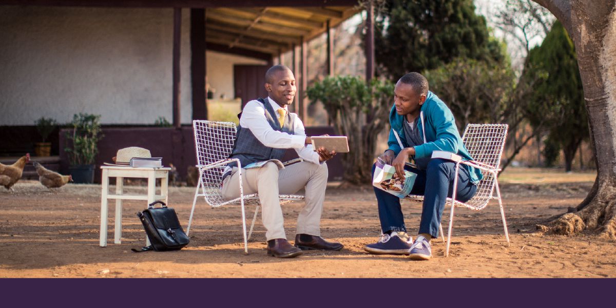 A brother in South Africa shows his Bible student a video