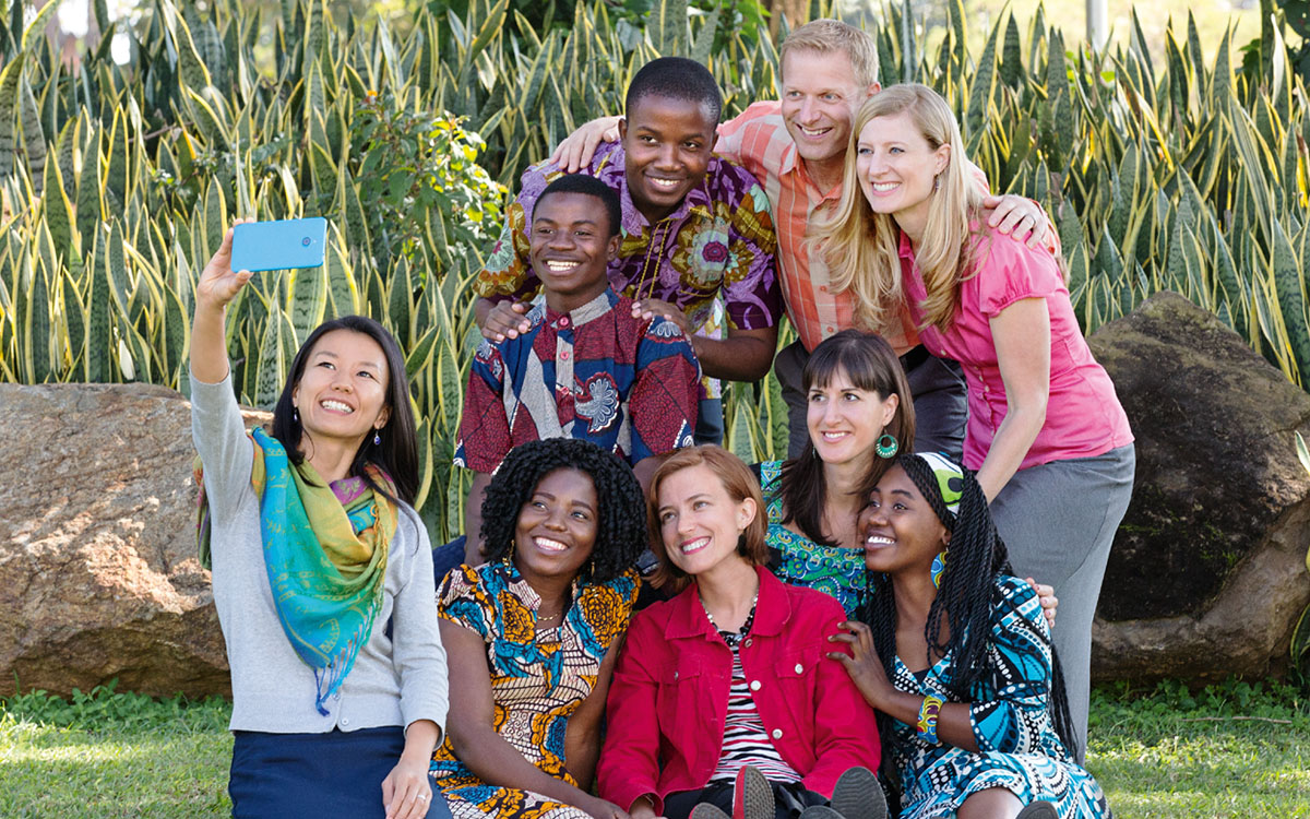 Young Witnesses of various races, wearing different types of clothing, pose for a picture