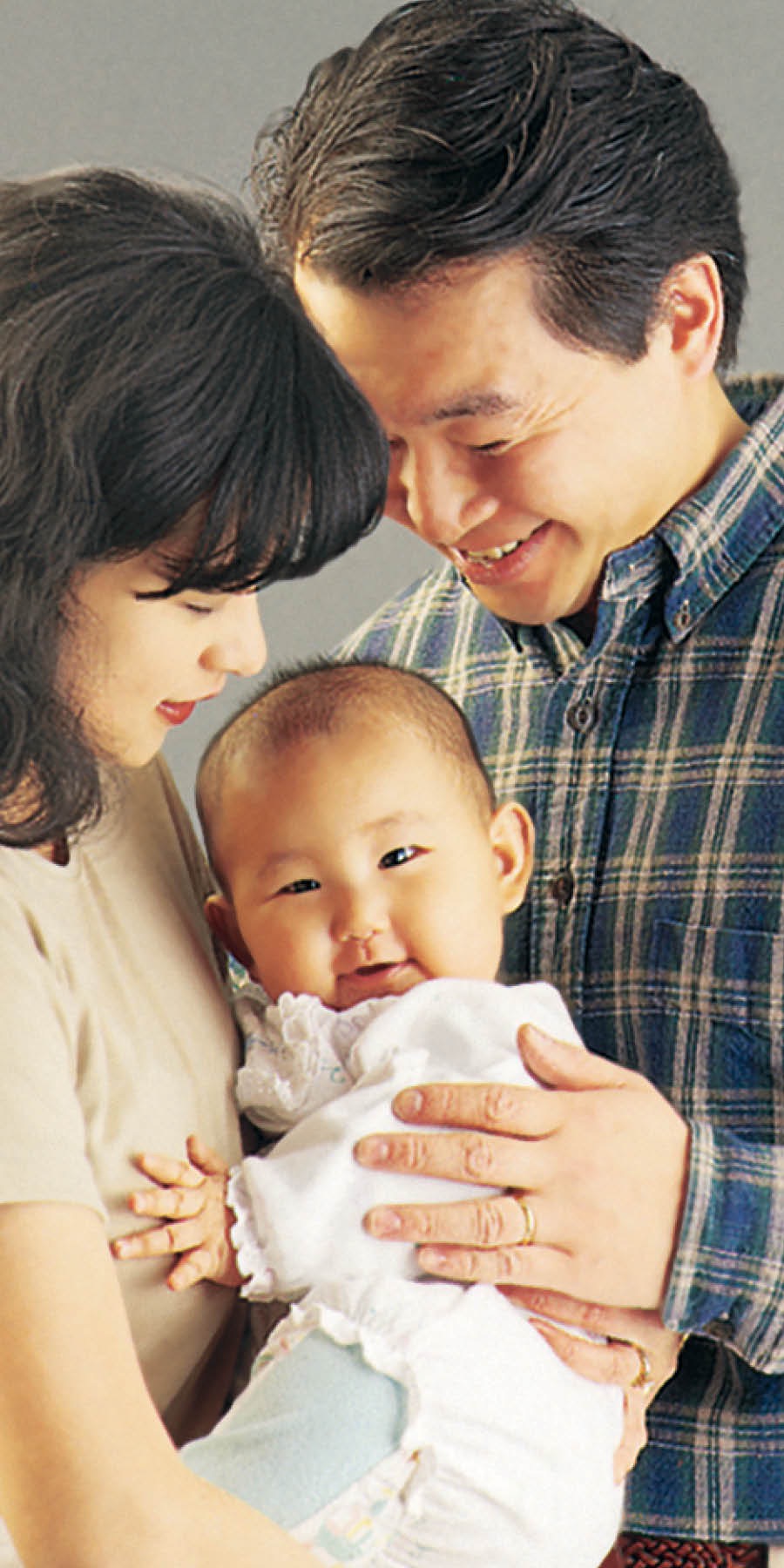 A couple with their baby