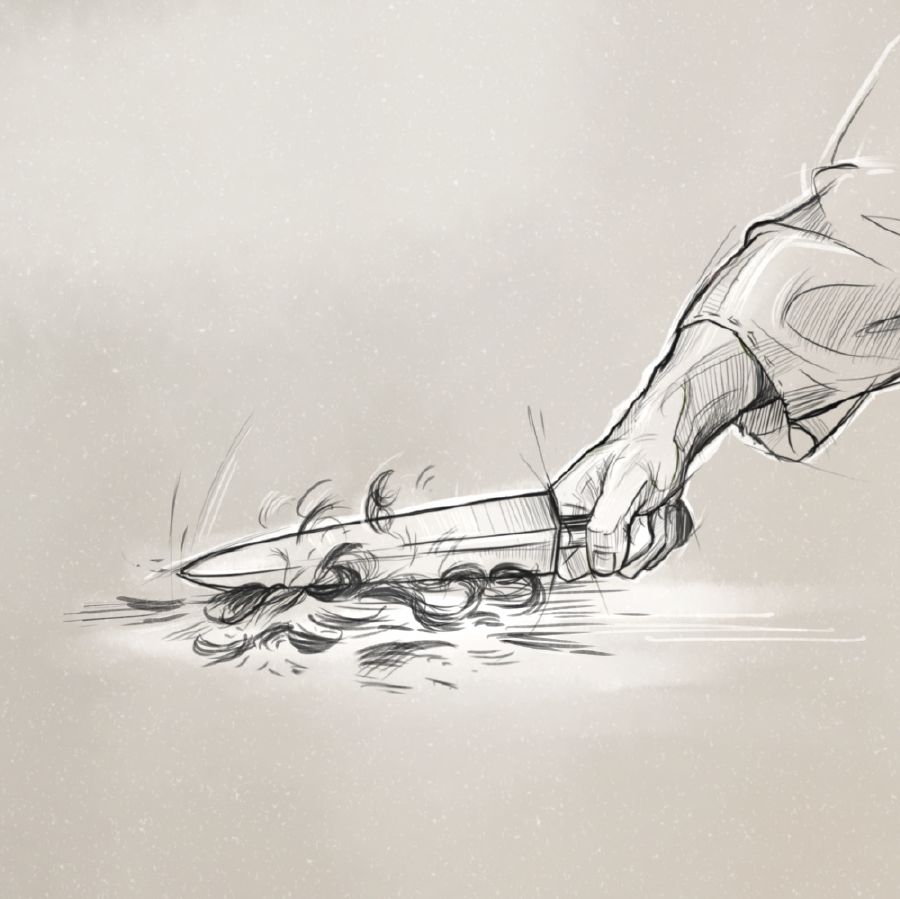 Ezekiel striking a portion of his shaved-off hair with a sword.