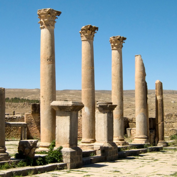 Ruins of a marketplace with elegant colonnades and stalls in Timgad