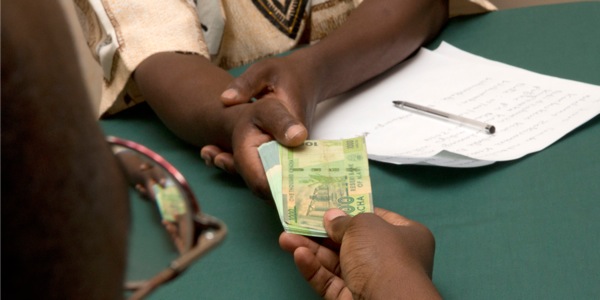 A man borrowing money from someone