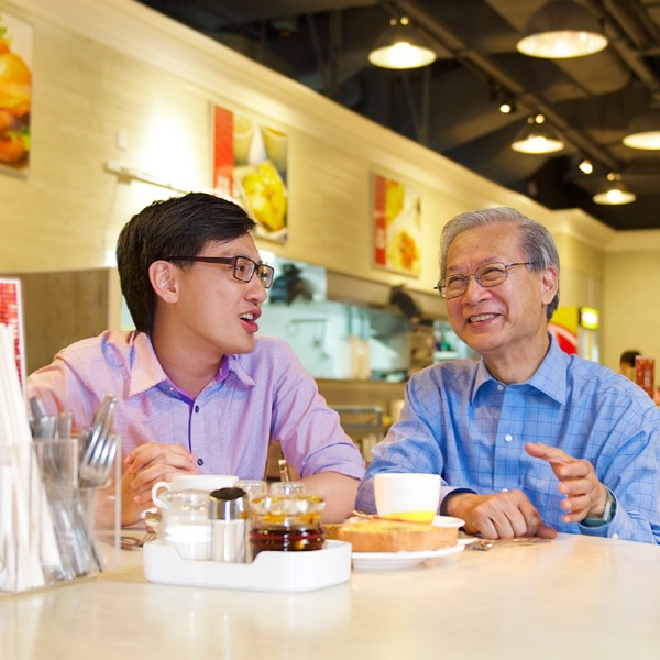 An elder and a ministerial servant having a relaxed conversation