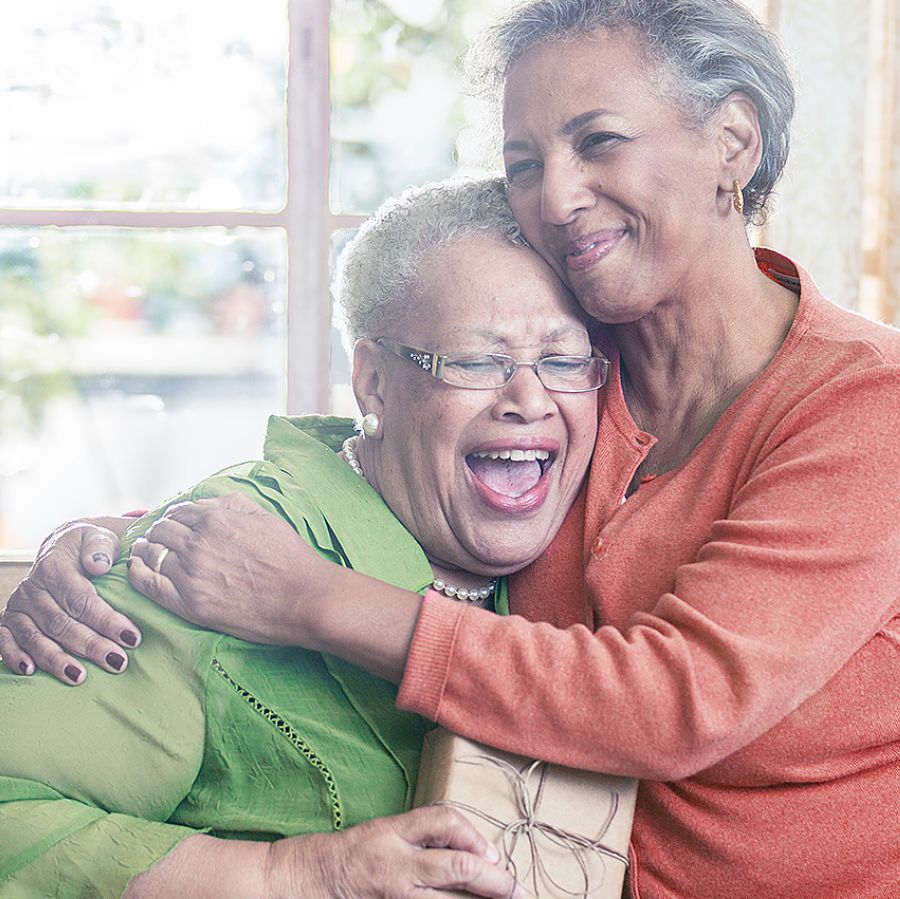 A Christian sister gives another sister a gift