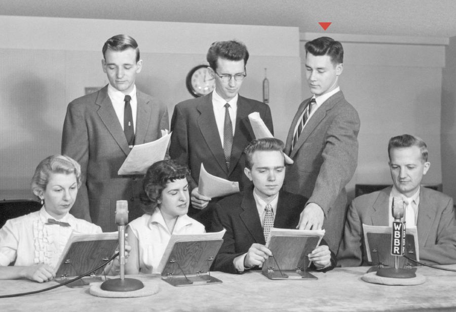 Charles Molohan works with a group preparing a broadcast from the WBBR studio