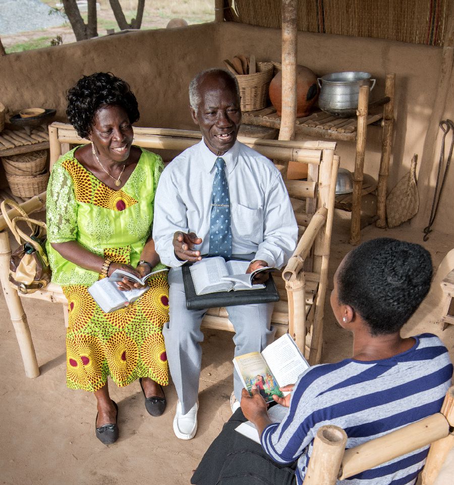 An older brother and his wife conduct a Bible study