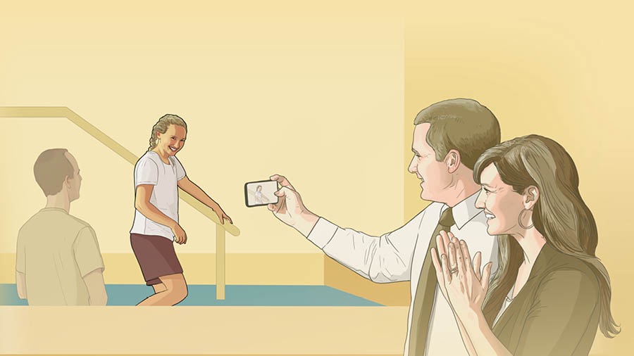 As a young woman walks into a baptismal pool, her parents take her picture