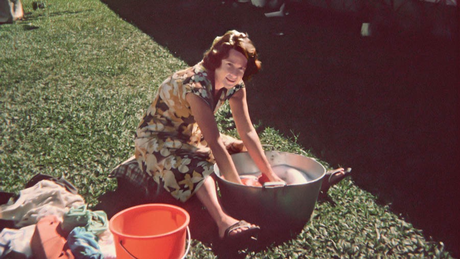In Tonga, Pam washes clothes using a tub and a bucket