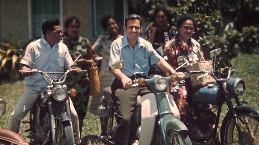 Winston takes a group, all of whom are on motorcycles, in service on Niue Island