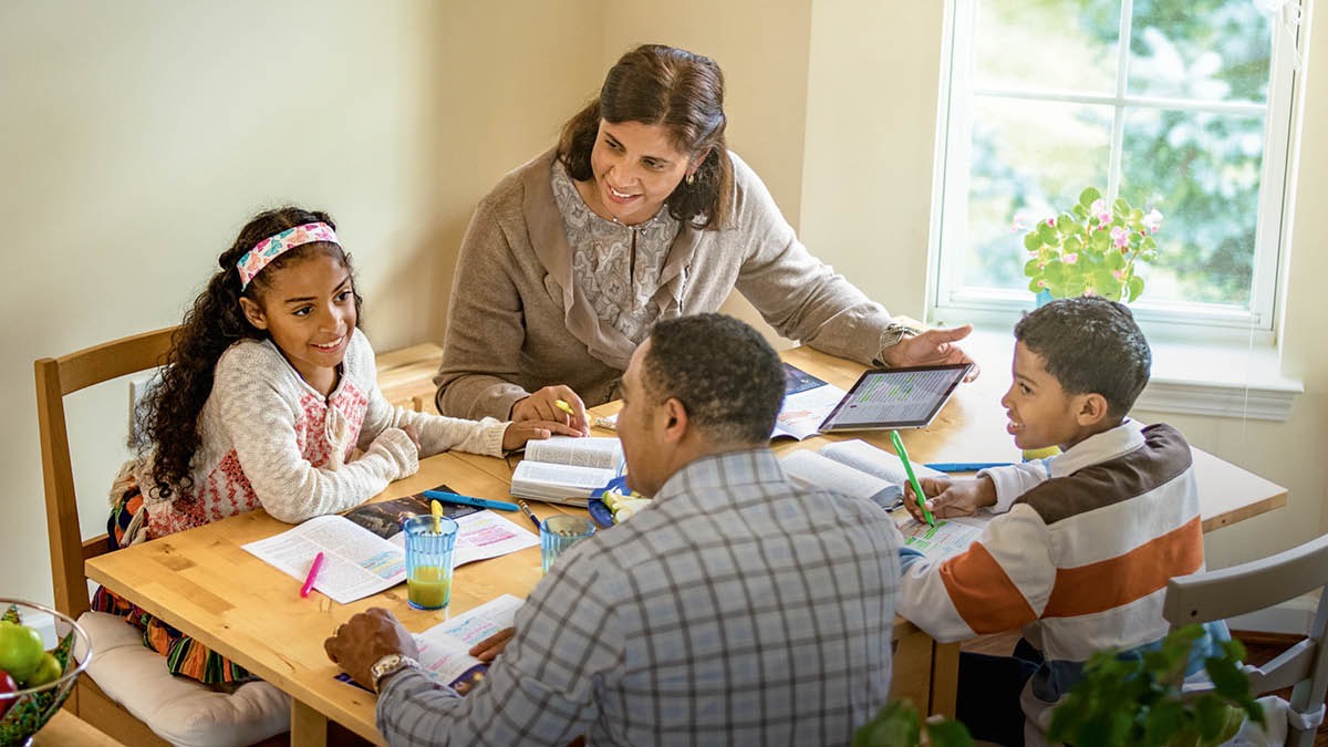 Parents help their children prepare for the Watchtower Study