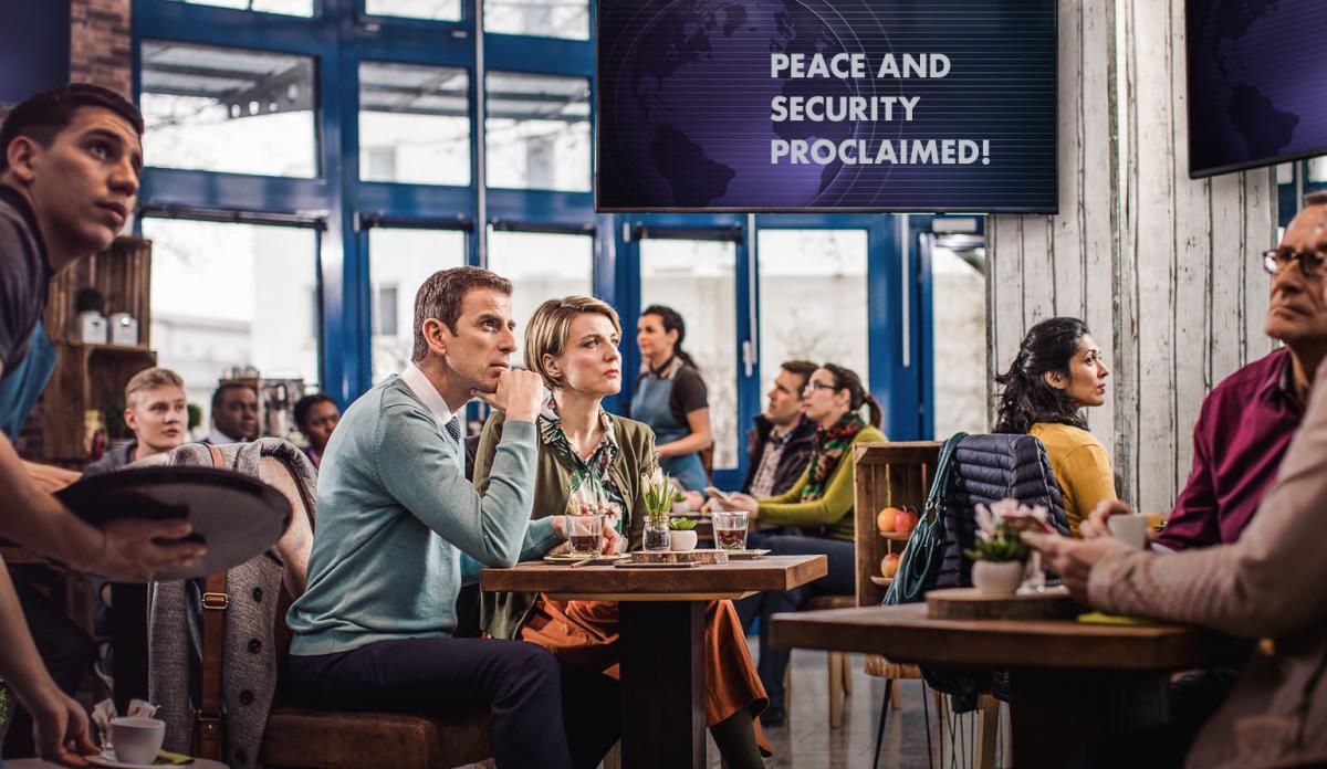 Patrons in a coffee shop are surprised when television news reports a proclamation of “peace and security,” but a Witness couple are not fooled