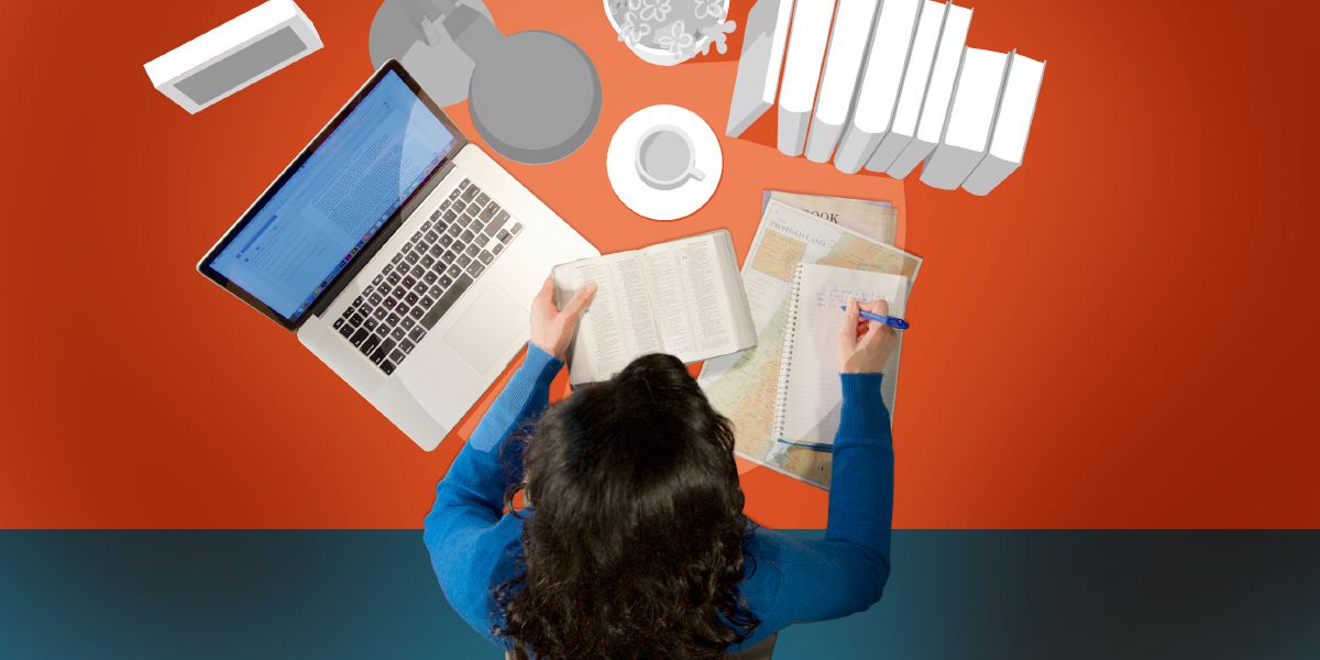 A woman uses Bible study tools while doing her Bible reading