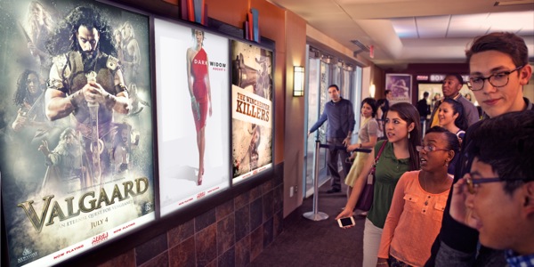 Young Christians at a movie theater looking at posters of different films