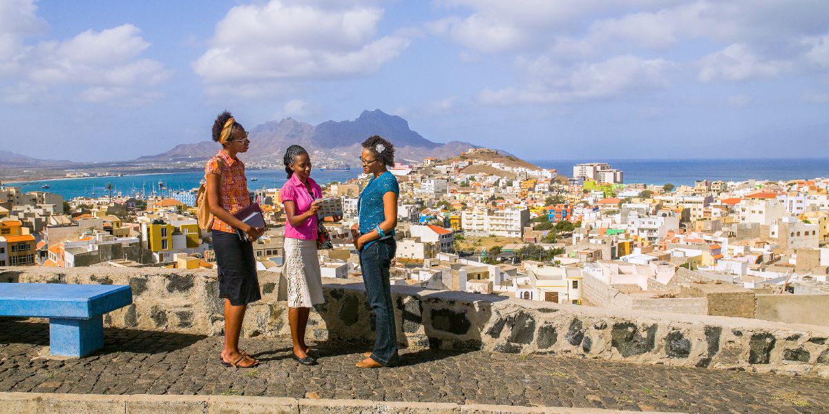 Jehovah’s Witnesses preach to a woman in Cape Verde