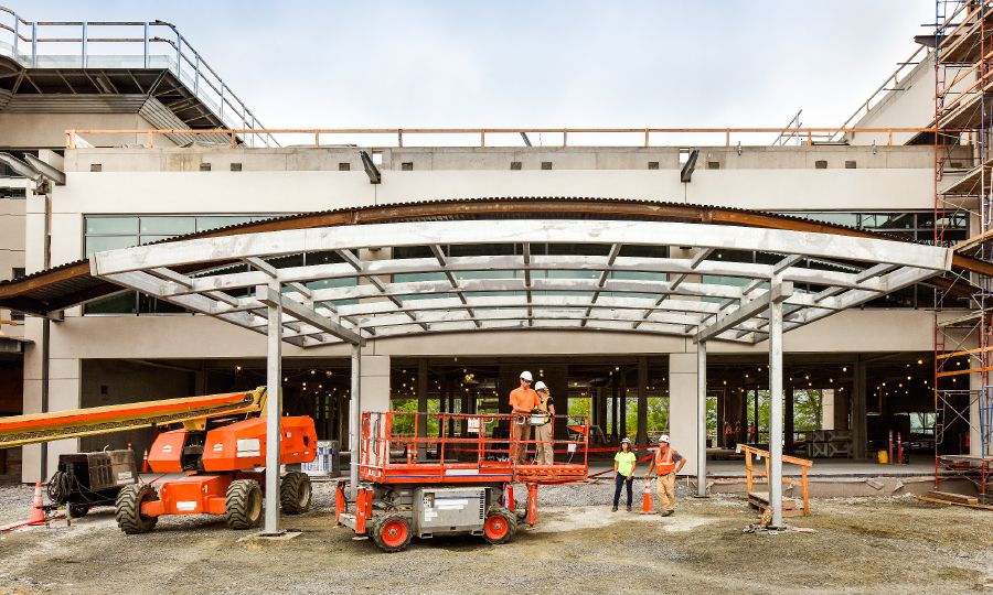 Volunteers work on the main entrance to the new world headquarters in Warwick, New York
