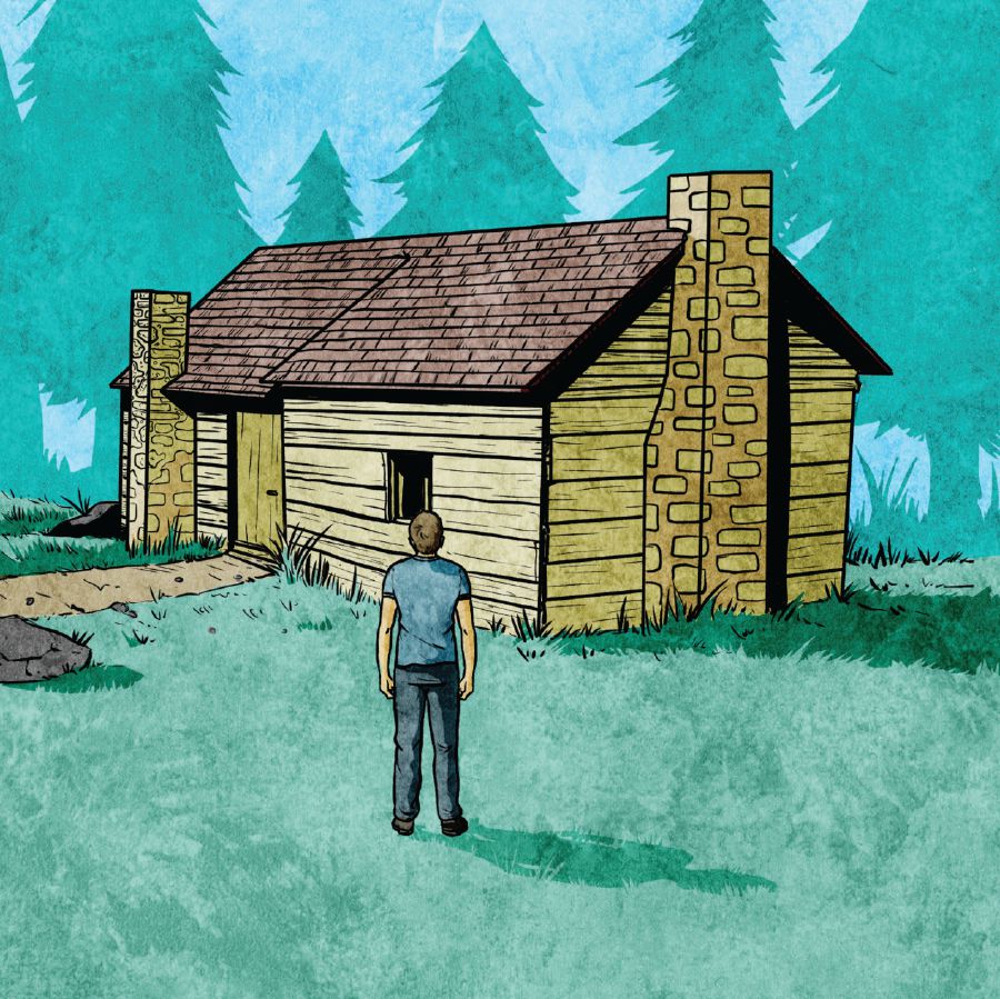 A young man looks at a house