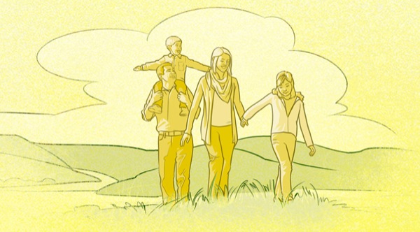 Una familia feliz paseando al aire libre