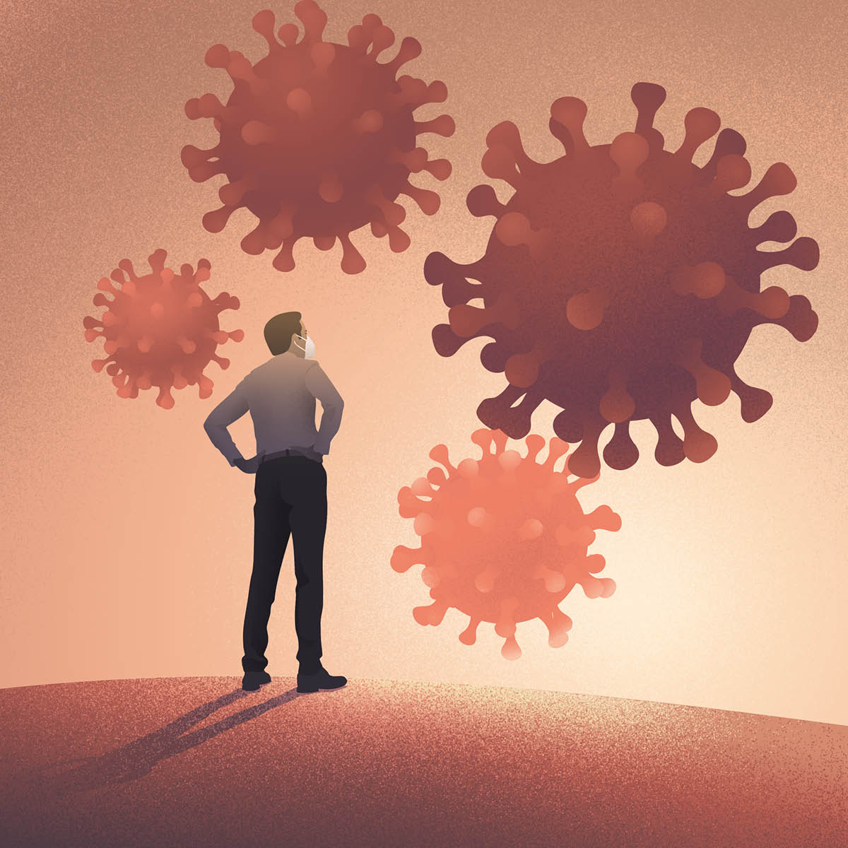 Un homme regarde un graphique d’informations sur les particules de coronavirus.