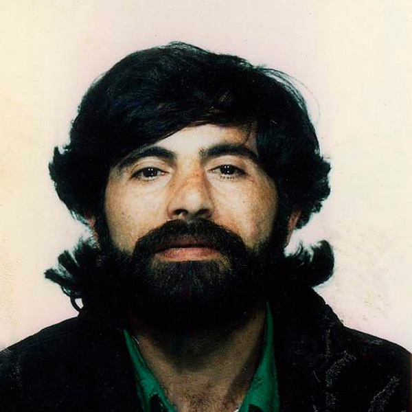 Annunziato Lugarà co pelo longo e barba antes de facer cambios na súa vida.