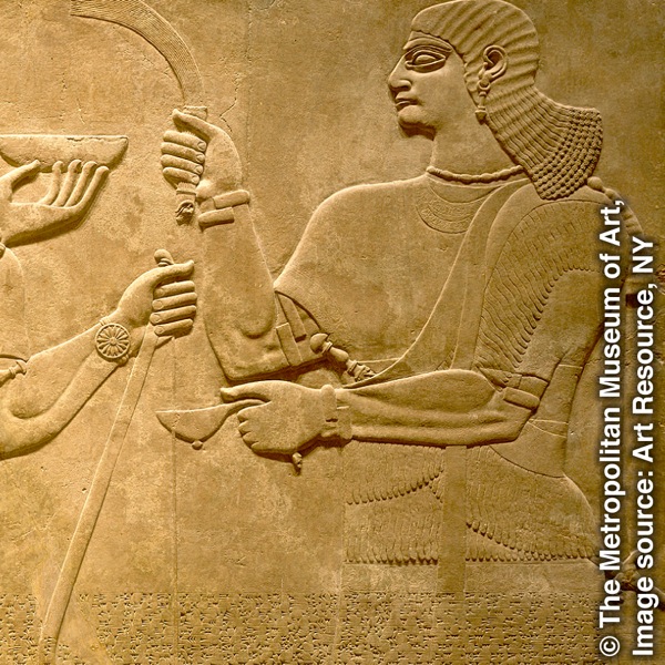 Yon pati nan yon imaj ki grave sou yon mi ki montre yon enik, se yon Asiryen ki te fè l