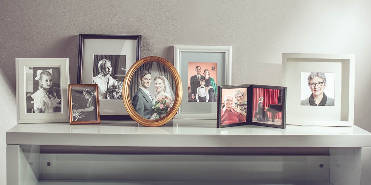 Photos of a woman’s life as a child, at a piano lesson, with a bouquet of flowers, on her wedding day, with her husband and son, with her husband in old age, playing the piano, and now alone