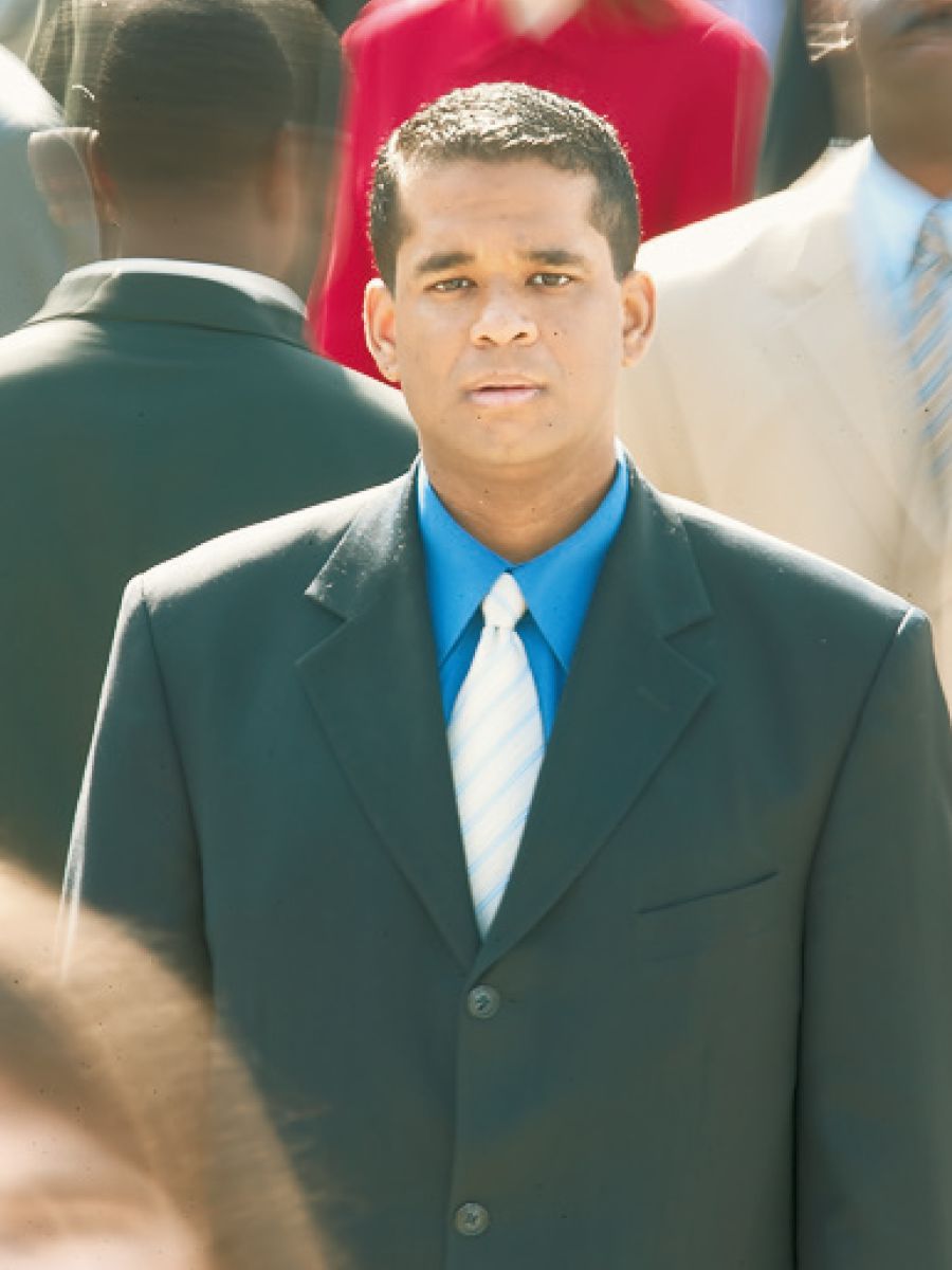 A man walks in a crowd