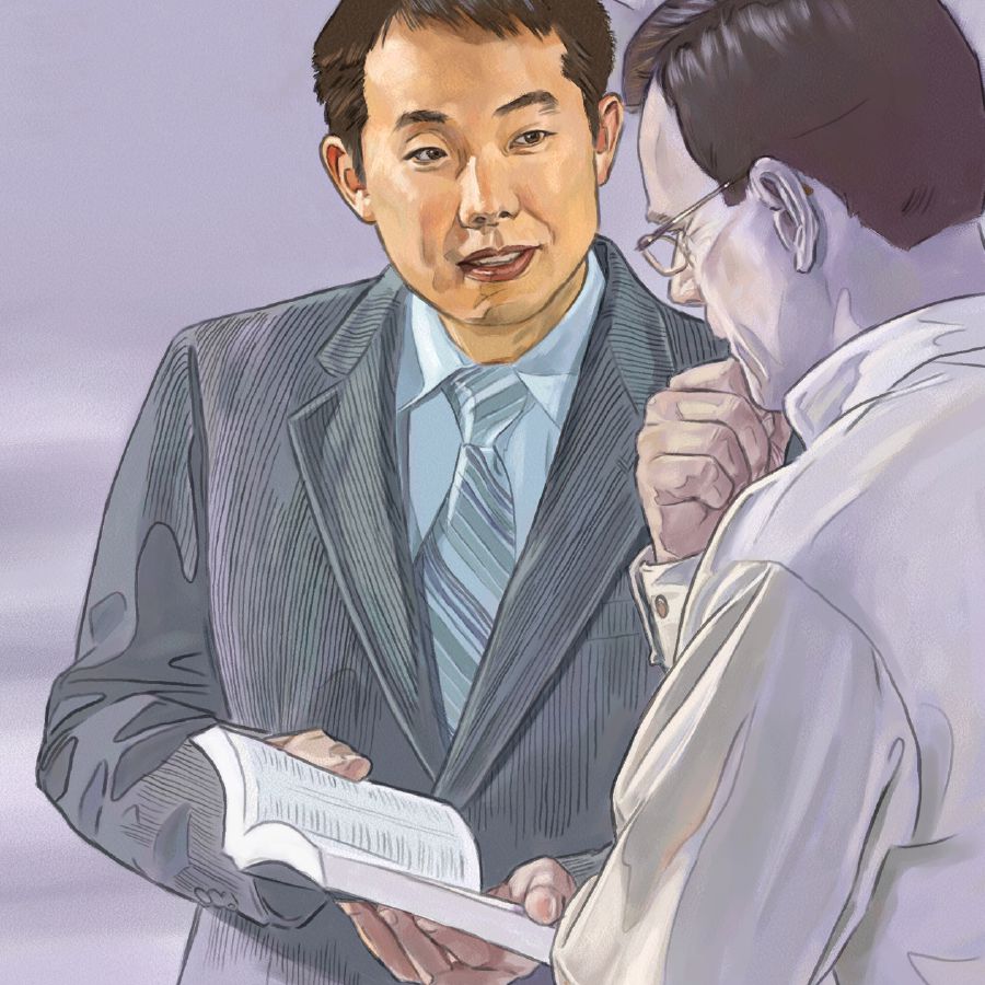 エホバの証人が男性に王国の良い知らせを伝えている。