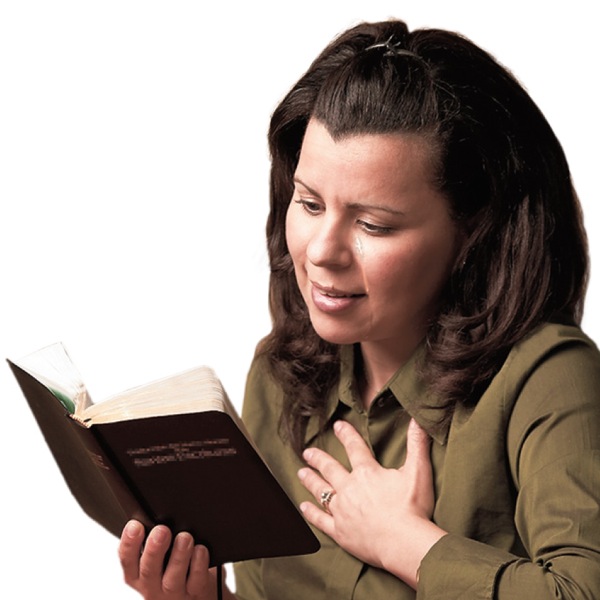 A grieving woman finding comfort from reading the Bible