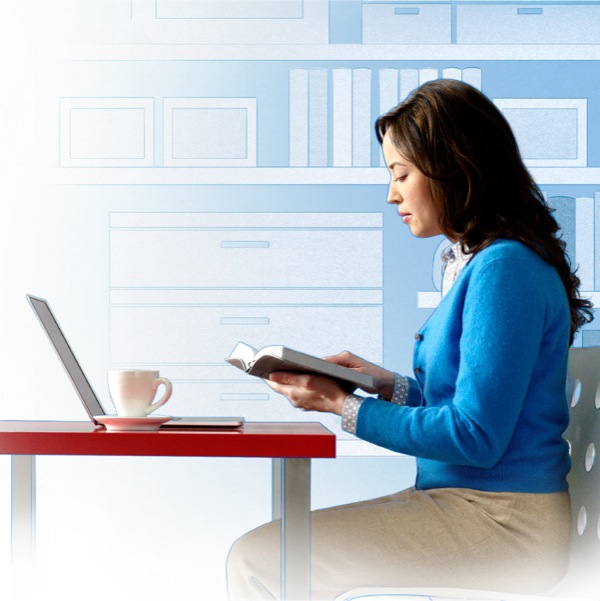 The woman reading her Bible and checking on the internet