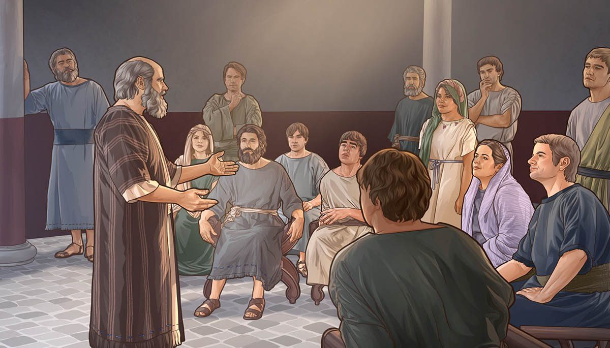 The apostle Paul preaching to the group of people in the school hall.