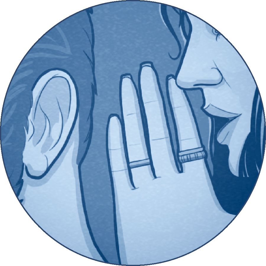 A woman whispers into a man’s ear